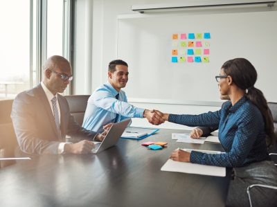 Two business colleagues shaking hands